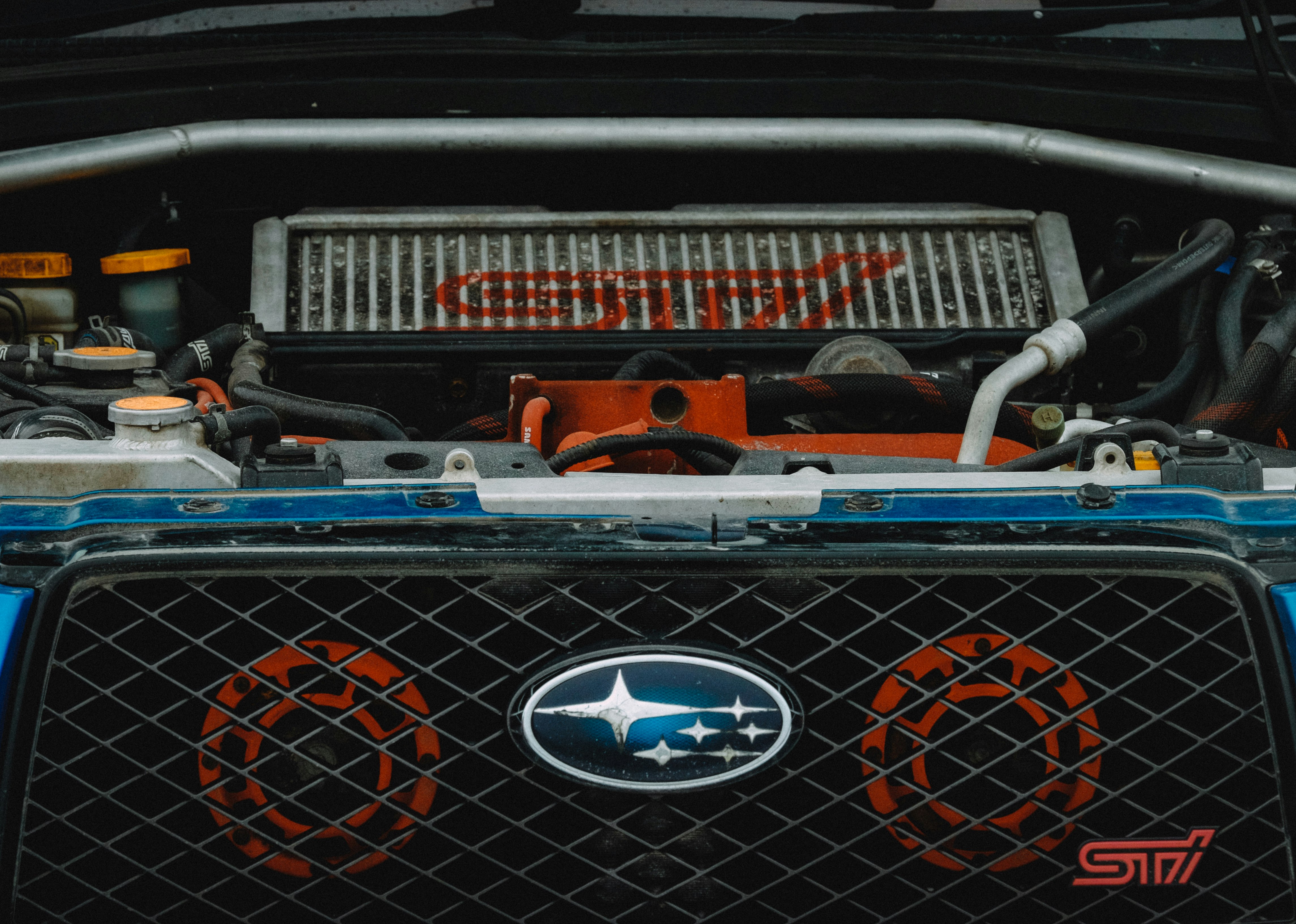 blue and orange chevrolet camaro